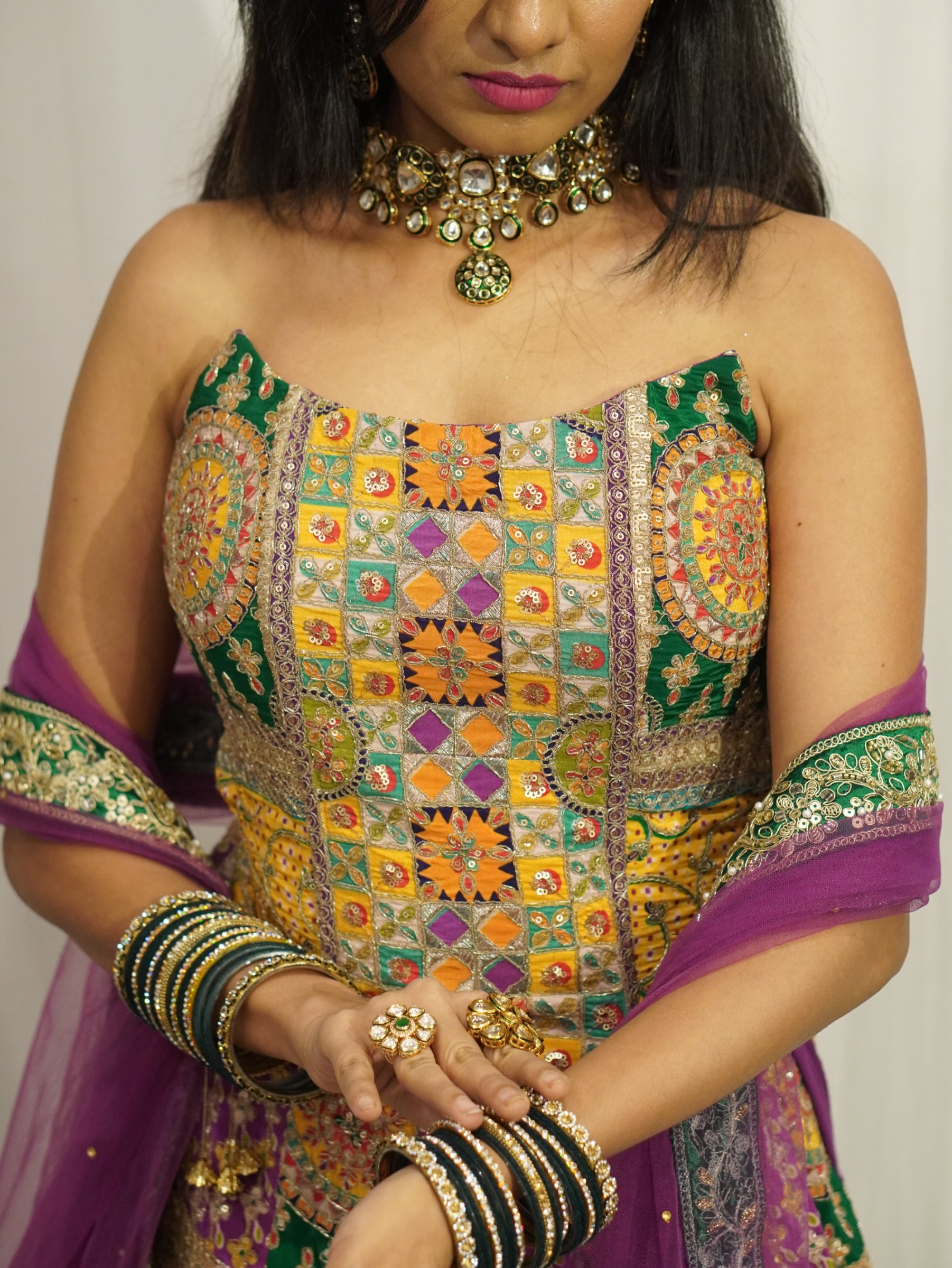 Mirror-work corset blouse of the Vibrant Prism Patchwork Lehenga by Label Shivaksh